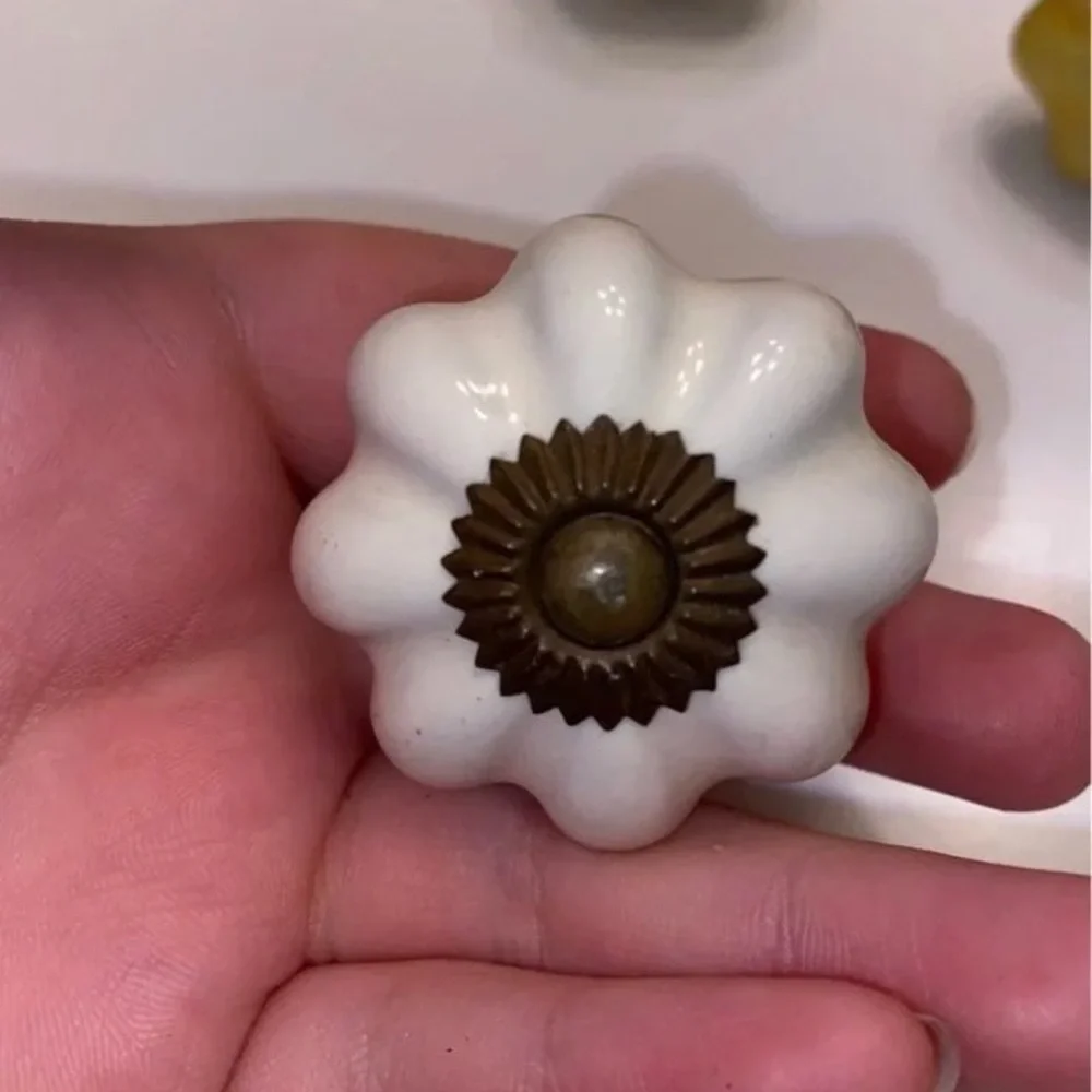 Pier 1 Drawer knobs set of 8 2 in each color( white,yellow, red, blue)
